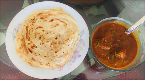 Parotta with chicken gravy