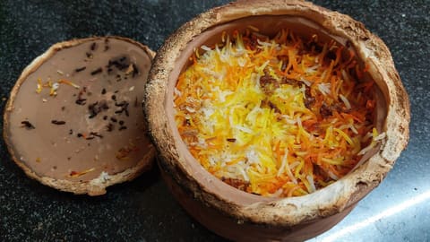 Lucknowi mutton matka dum biryani