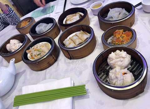 A table of assorted dim sum dishes for lunch