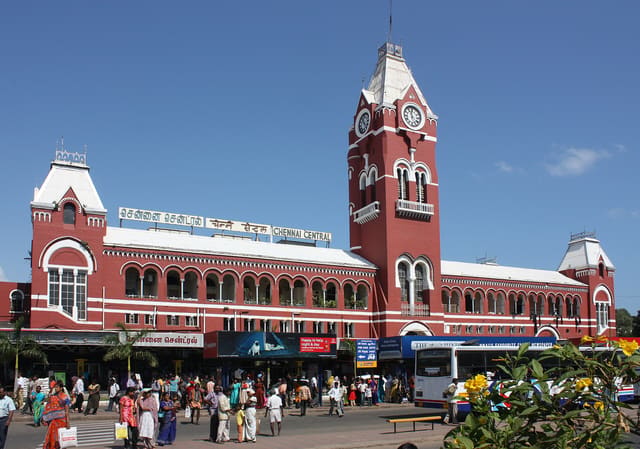 The red-brick facade and clock tower of Chennai Central railway station