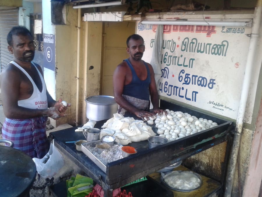 Men making parotta at a shop